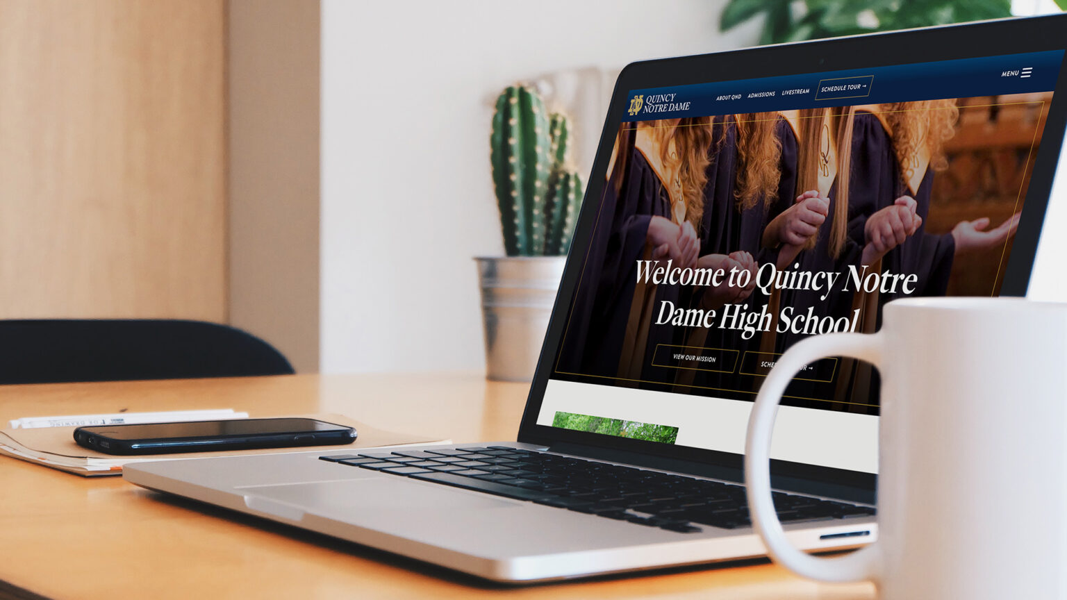 Quincy Notre Dame Laptop Mockup